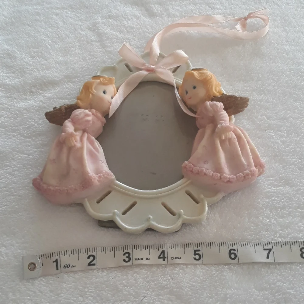 Angel photo frame with pink ribbon